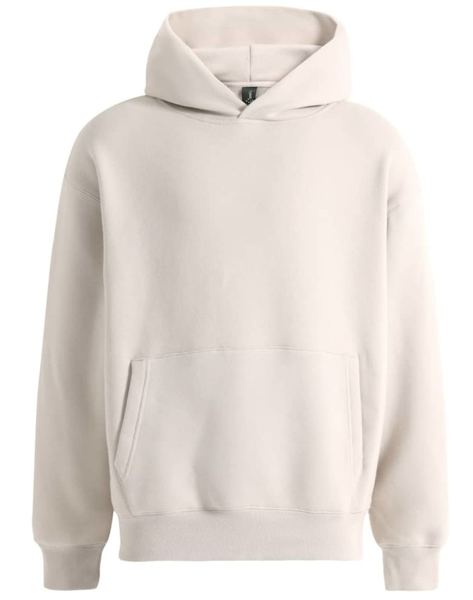 A unisex premium fleece oversized hoodie in cream with a front pocket and a hood. Features a logo.