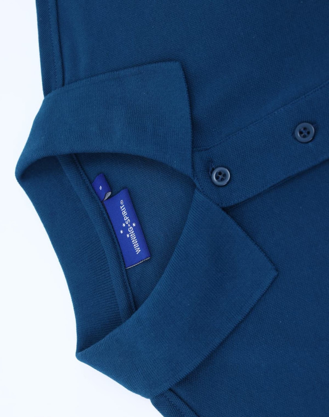 A navy blue men's classic cotton/poly pique short sleeve polo, featuring a folded collar and buttons.
