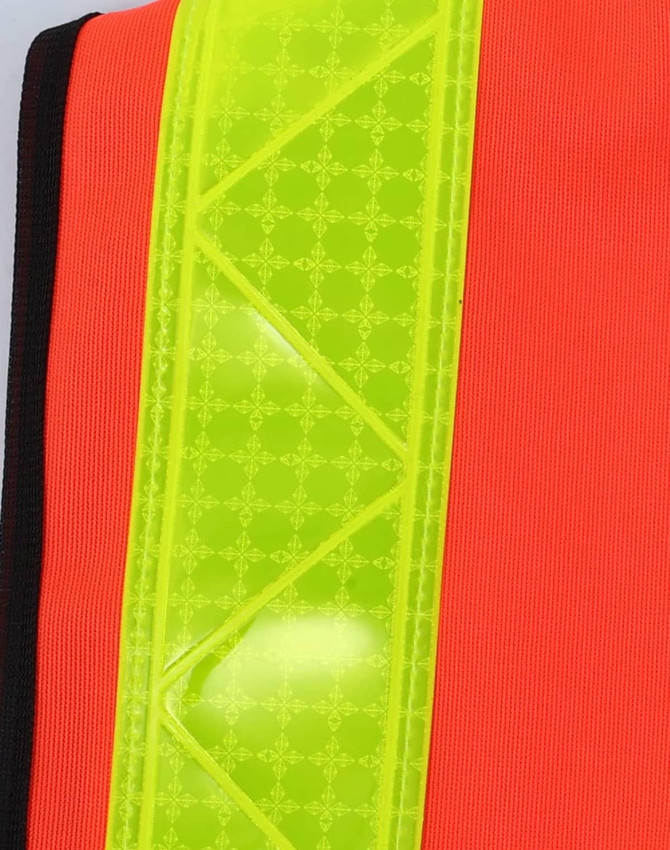 A high-visibility vest in bright orange with a reflective yellow strip and a logo.