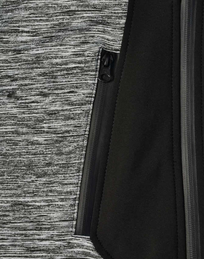 A grey and black workwear jacket featuring a zippered pocket and a textured fabric design.