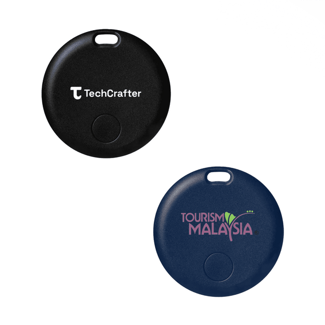 Two round tracking devices in black and navy blue, featuring logos on the front.