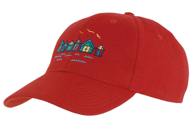 A red college cap featuring an embroidered design of colourful houses and seagulls. It has a branded logo.