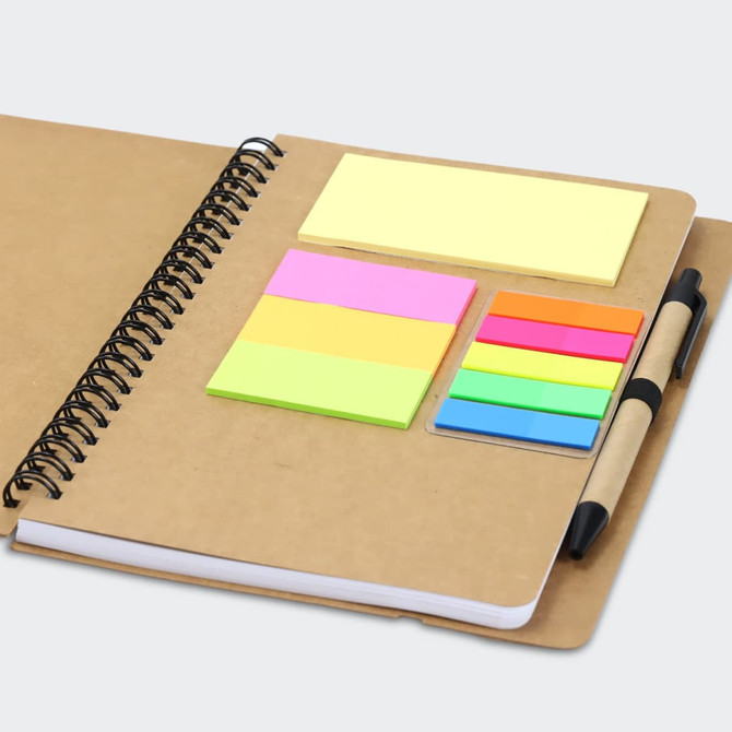 A Kraft notebook featuring a spiral binding, assorted sticky notes in bright colours, and a pen holder.