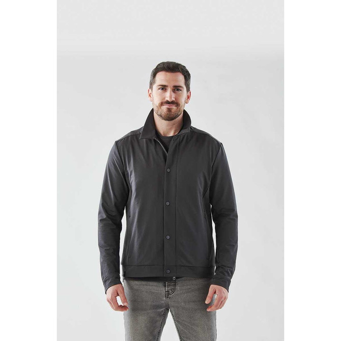 A man wearing a black Men's Soho Jacket, front view, against a plain background. The jacket has a logo on it.