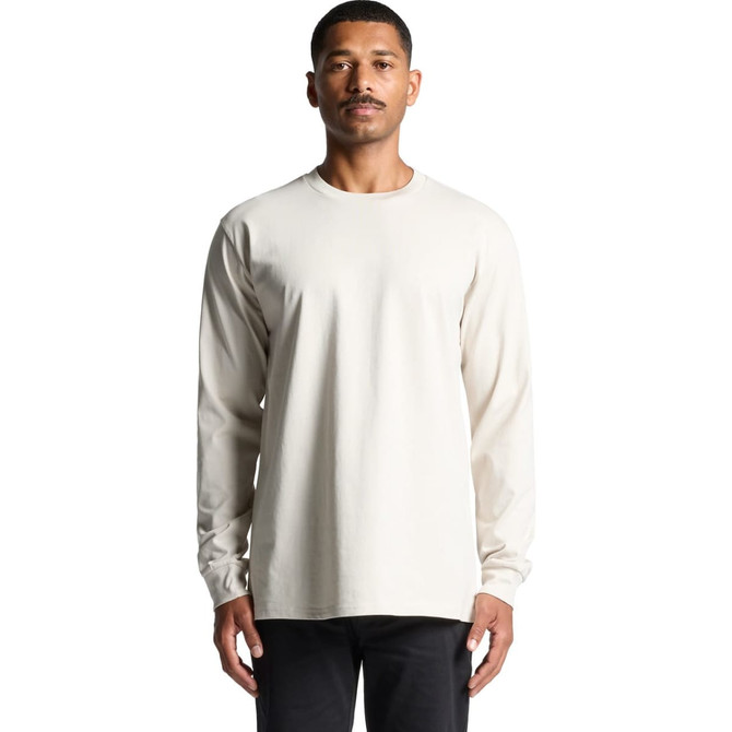 A long-sleeve t-shirt in a creamy beige colour with a logo on the front.