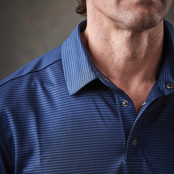 A close-up of a men's blue striped polo shirt featuring a collar and button details. The shirt has a logo on it.