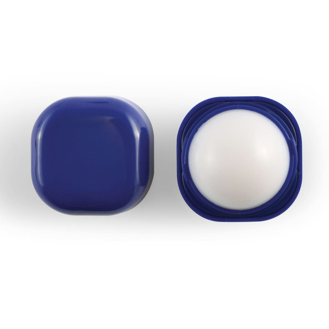 A cube-shaped lip balm in a deep blue container with a white balm visible inside. The container has a logo.
