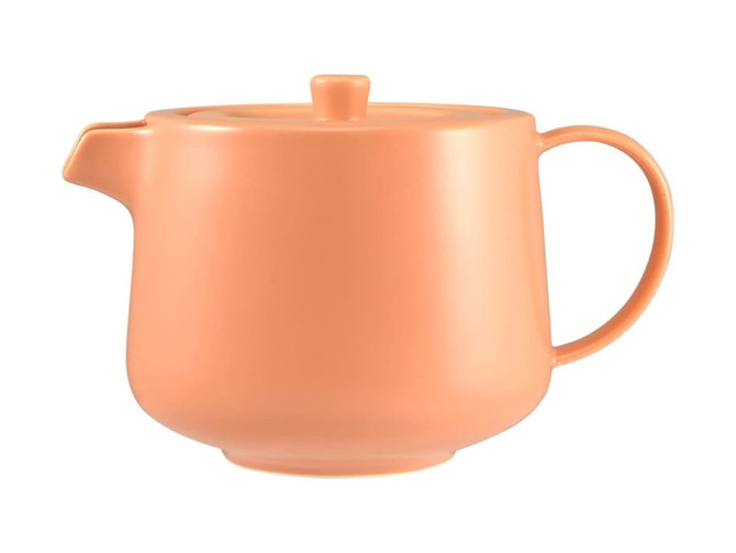 A teapot with infuser in a soft peach colour, featuring a round body, a small spout, and a handle.