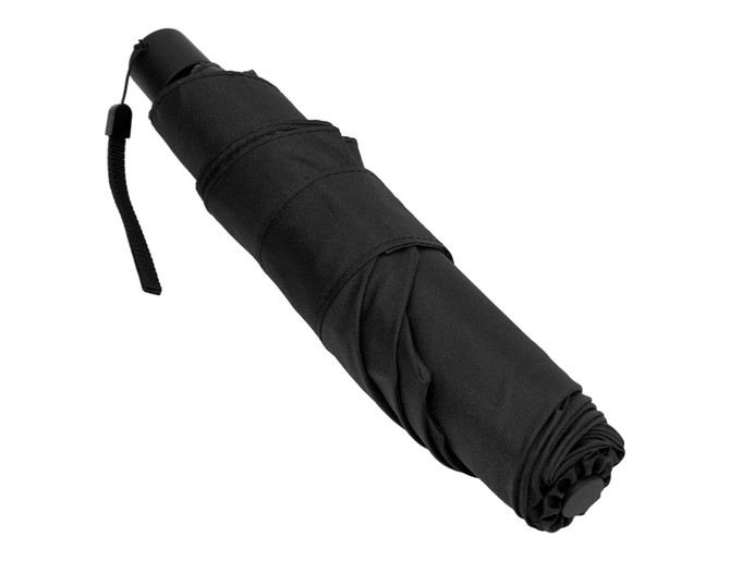 A compact black umbrella, folded and secured with a strap, featuring a logo on its handle.