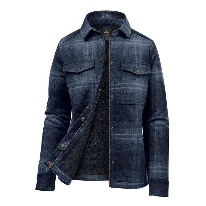 A women's plaid jacket in navy blue, featuring a Sherpa lining and two chest pockets. It has a branded logo.