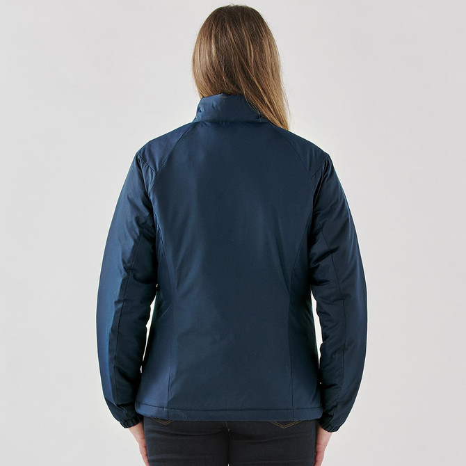 A woman wearing a navy blue thermal jacket, viewed from the back. The jacket features a collar and has a logo.