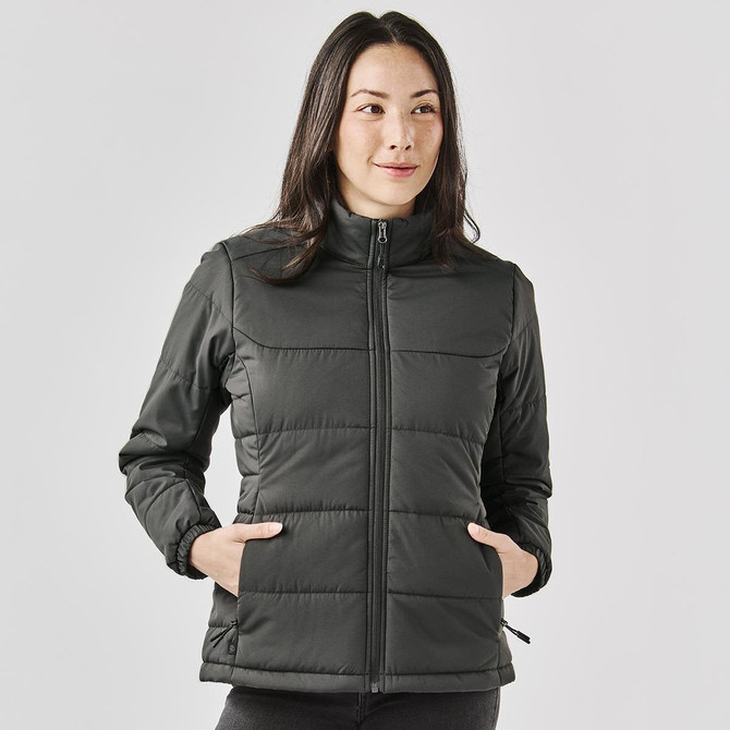 A women's puffer jacket in dark grey with a zip front, featuring side pockets and a high collar, with branding.
