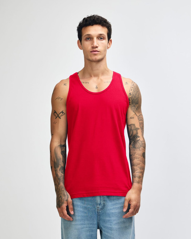 A red unisex fine jersey tank top displayed on a model, featuring a logo on the garment.