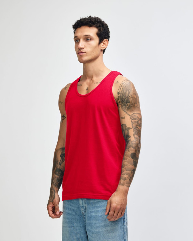 A red unisex fine jersey tank top is displayed on a model against a plain background. It has a logo on it.