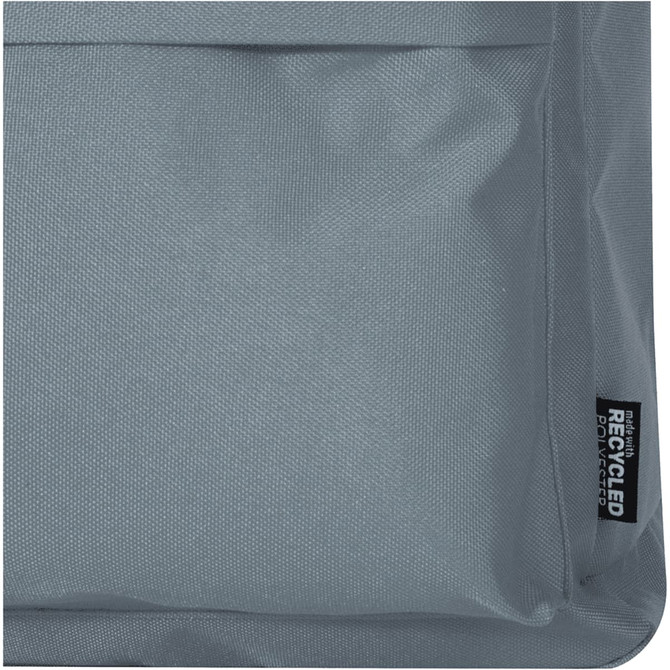 A grey fabric section of a laptop backpack featuring a logo and a textured surface.