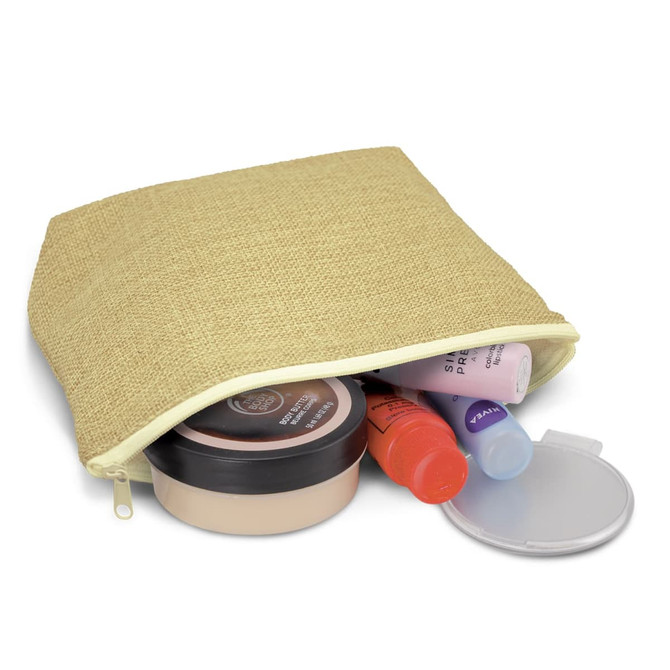 A tan cosmetic bag with a zip, containing various skincare and cosmetic products. It has a logo on the front.