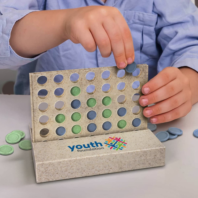 A game display featuring a light-coloured board with blue and green discs, showcasing a four in a row design.