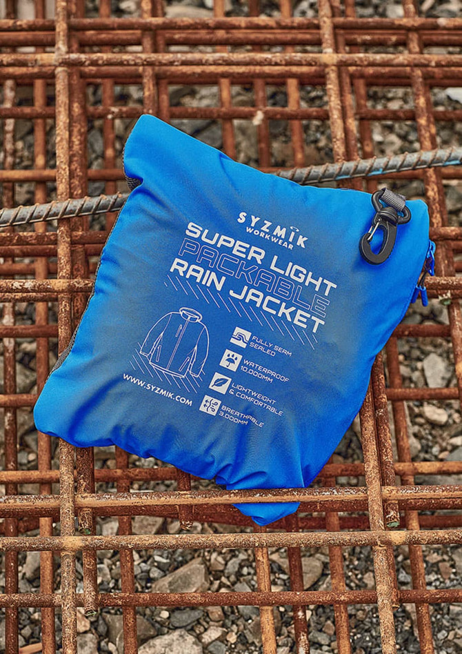 A blue packable rain jacket folded into a compact pouch with a logo and zipper.