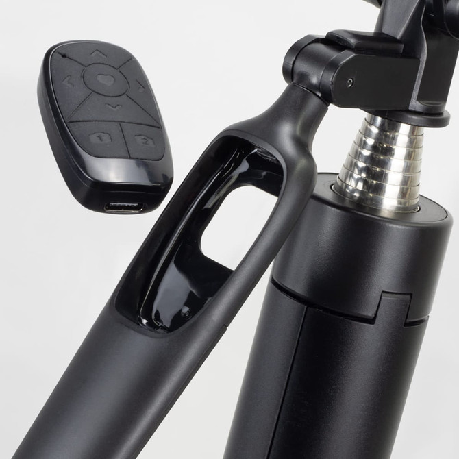 A black selfie stick tripod with a remote control attached, featuring a shiny metallic section and a sleek design.