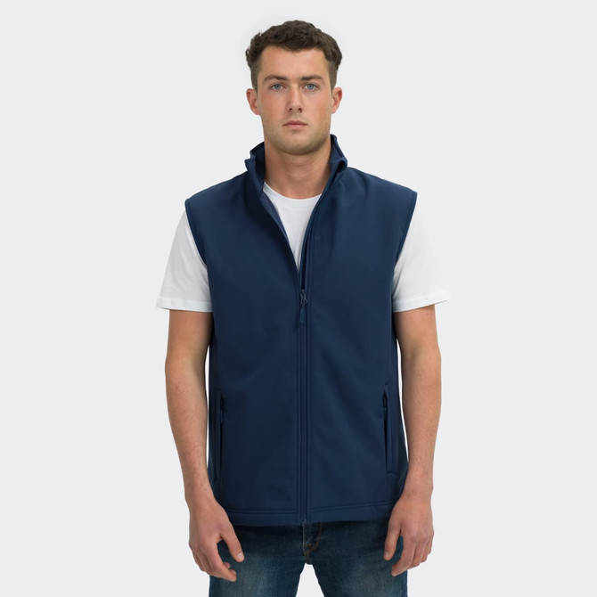 A navy blue men's vest with a zip front, standing model, featuring side pockets and a collar, with a logo.