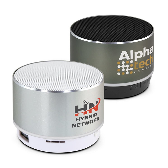 Two Bluetooth speakers in silver and black, featuring perforated tops and branding logos on the body.