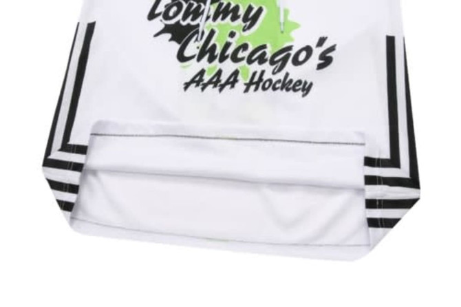 A white ice hockey racing suit featuring black detailing and a logo at the chest area.