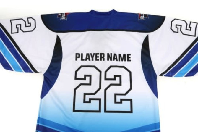 An ice hockey uniform jersey in blue and white, featuring a large number 22 and space for a player's name.