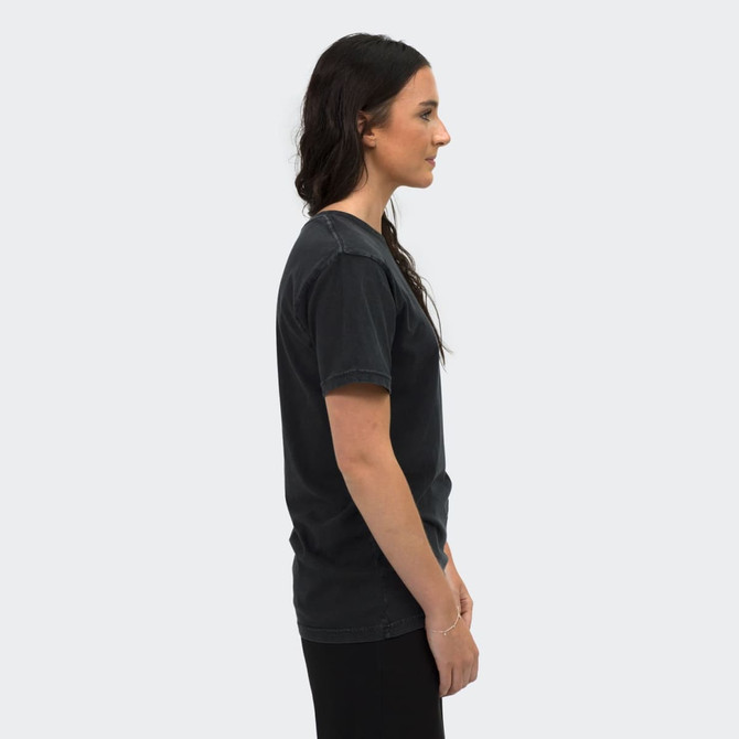 A faded unisex T-shirt in dark grey, displayed on a model from the side. Features a brand logo.