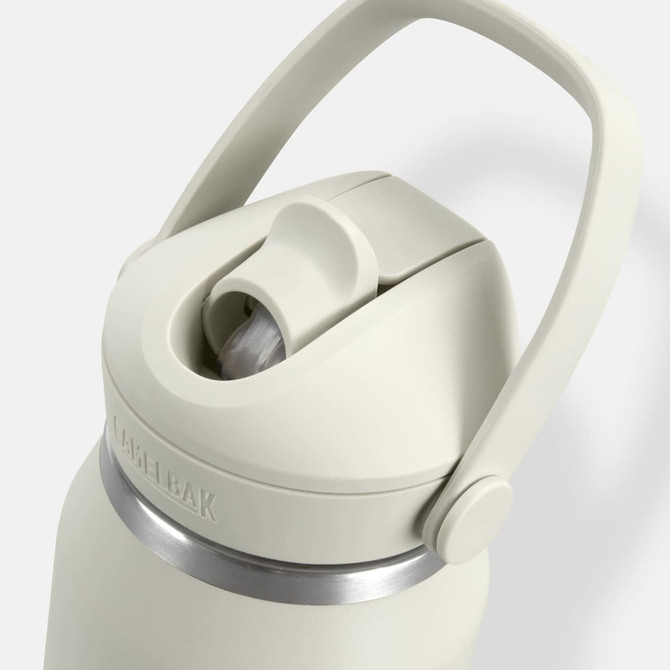 A drink bottle in light green with a flip straw and a carry handle, featuring a stainless steel base and logo.