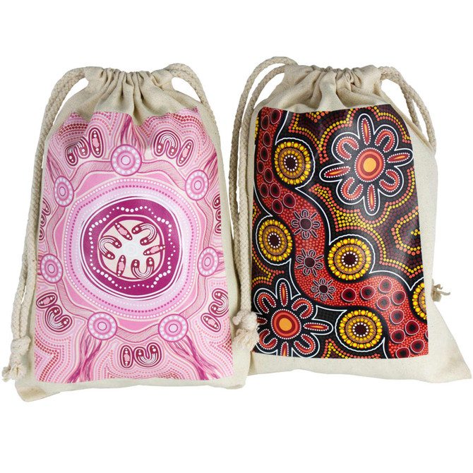 A 100% cotton drawstring bag featuring colourful Aboriginal artwork in pink and black designs. It has a logo.