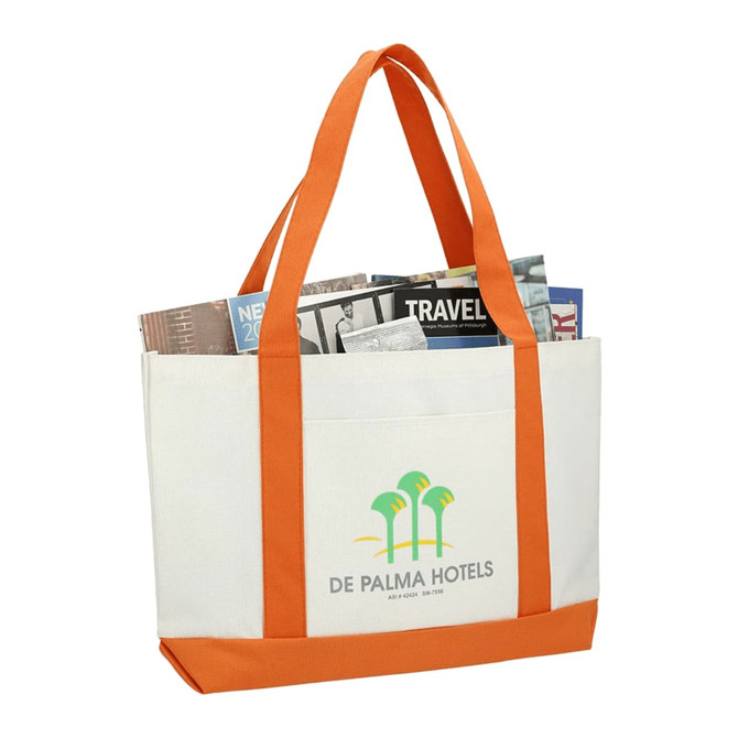 A large cream tote bag with orange handles, featuring a logo and filled with newspapers.
