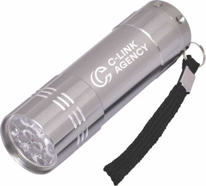 A silver mini torch featuring multiple LED lights, a keyring attachment, and a textured grip. It has a branding logo.
