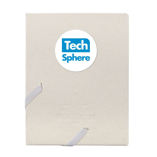 A beige planner with a white elastic band closure and a round logo on the front.