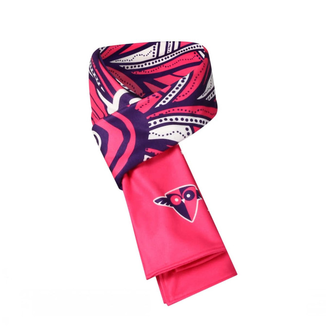 A scarf in vibrant pink and navy, featuring bold patterns and a logo.