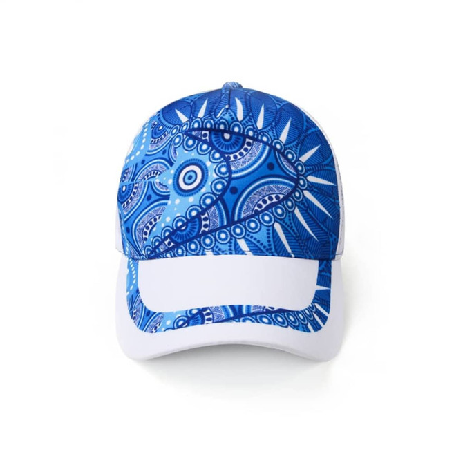 A blue and white sport cap featuring a vibrant, abstract pattern and a branded logo on the front.