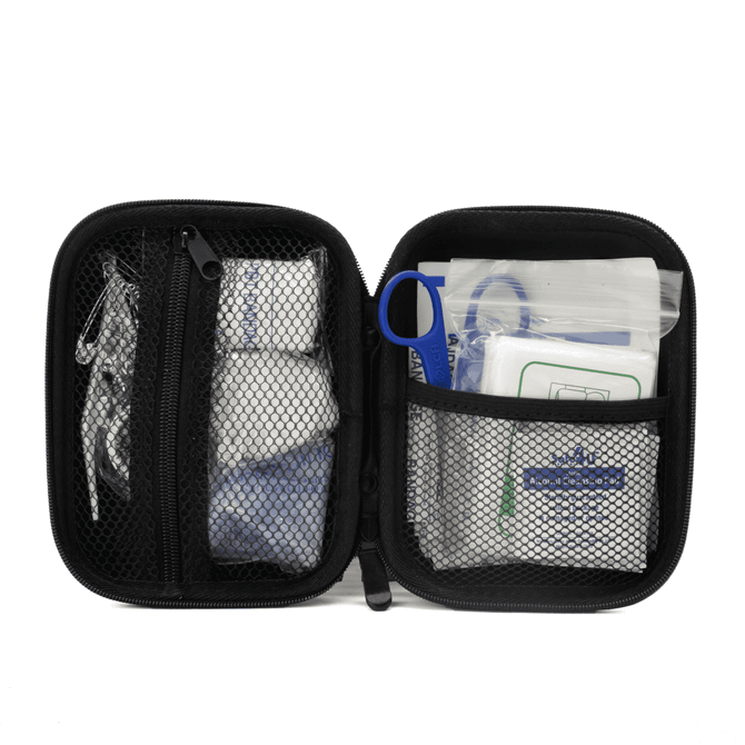 A compact black first aid kit opened to reveal various medical supplies, including dressings, antiseptics, and tools.