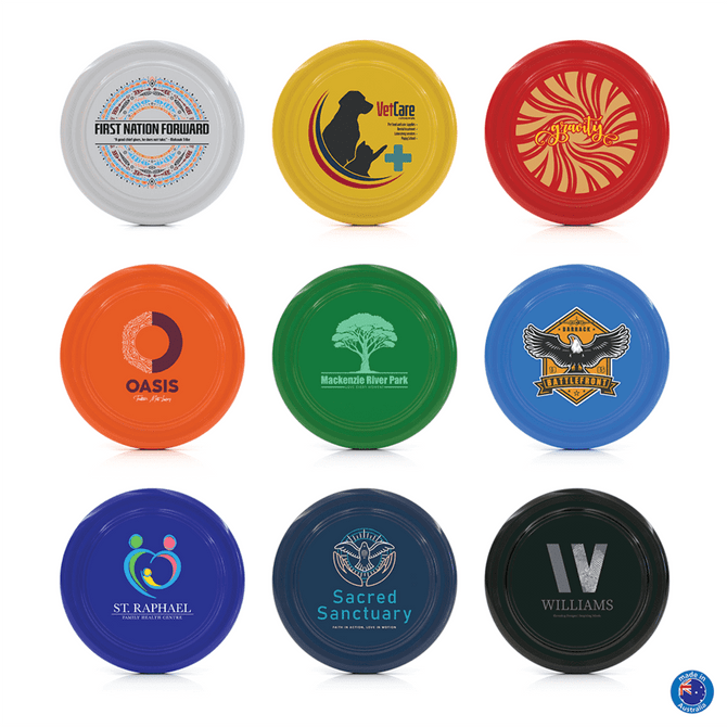 A collection of nine colourful frisbees featuring various designs and logos, including white, orange, green, blue, and black.