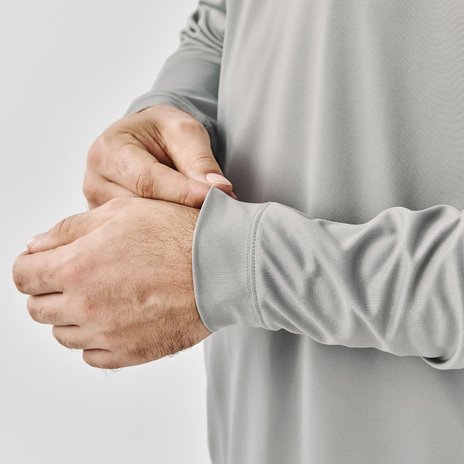 A grey Men's Monterey 1/4 Zip Pullover displayed with focus on the wrist and cuff detail. It features a logo.