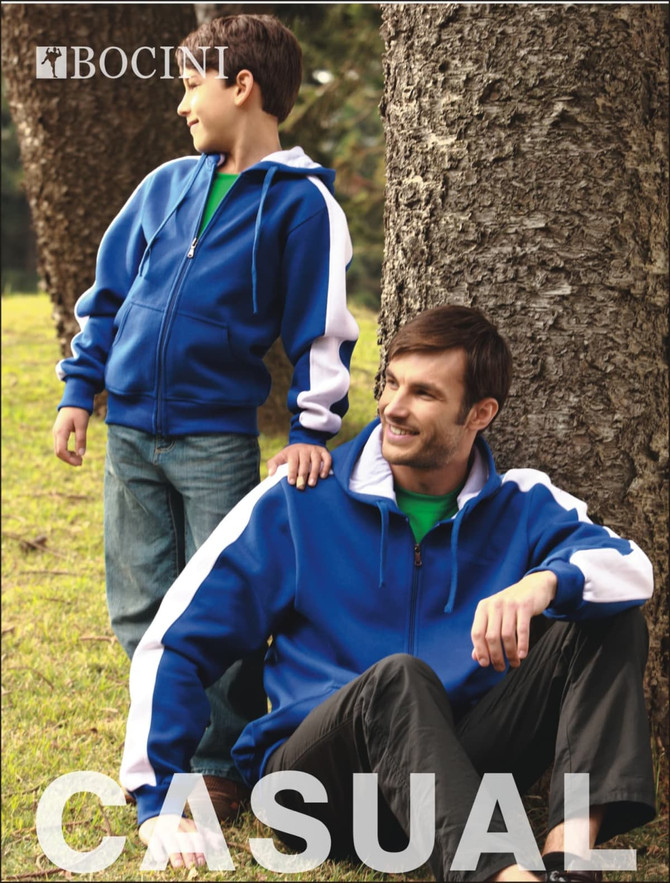 A blue and white fleece zip-through hoodie worn by a child and an adult, sitting outdoors beside a tree.