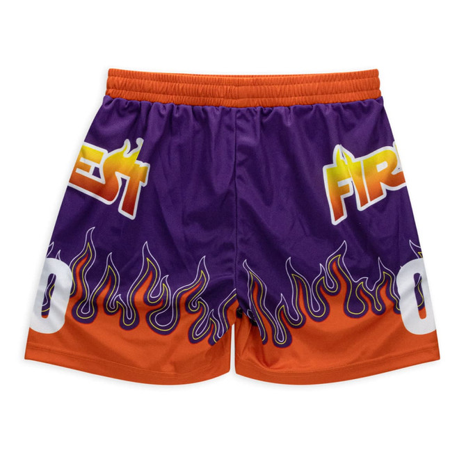 A pair of custom women's active shorts featuring a purple and orange design with flame graphics and decorative text.