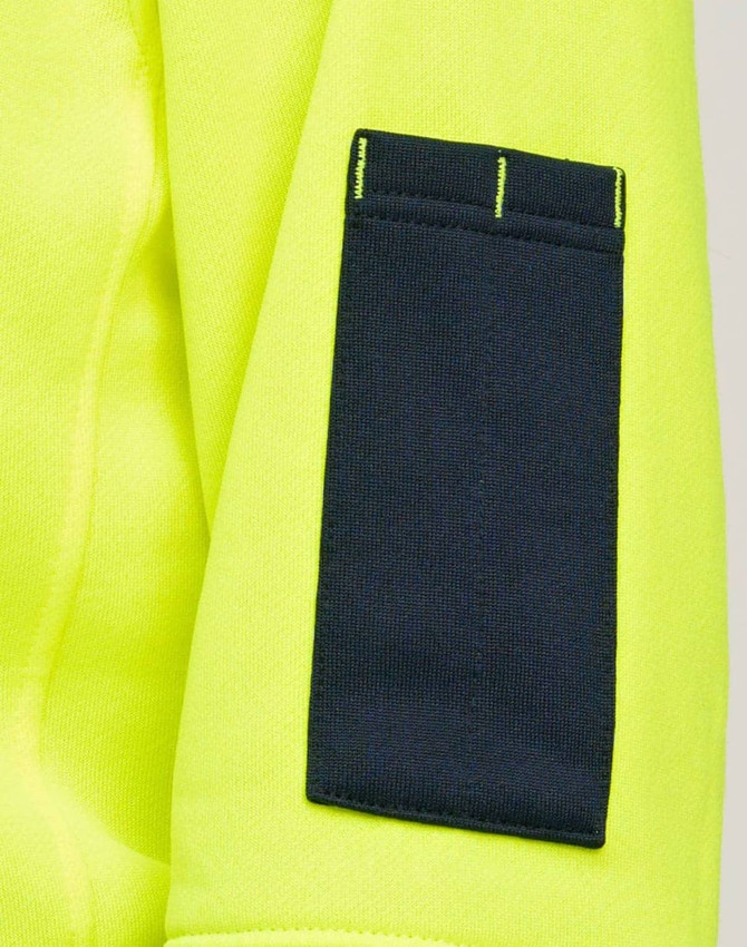 A bright yellow fleece hoodie features a dark navy arm patch and has a visible logo.