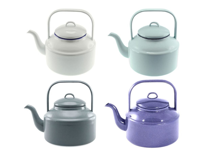 A collection of four tea kettles in white, pastel blue, dark grey, and purple with a classic design and handles.