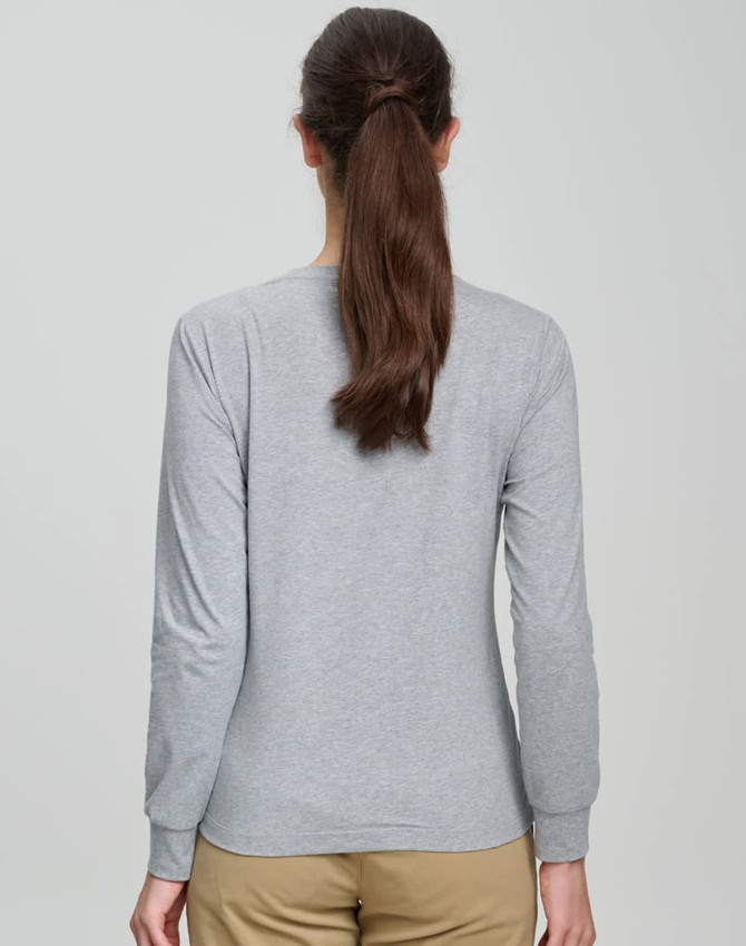 A long-sleeved, grey women's t-shirt made of premium cotton with a logo on the back.