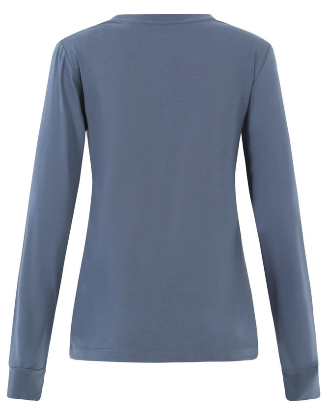 A long-sleeve tee shirt in a muted blue colour, featuring a simple design and a logo on the back.