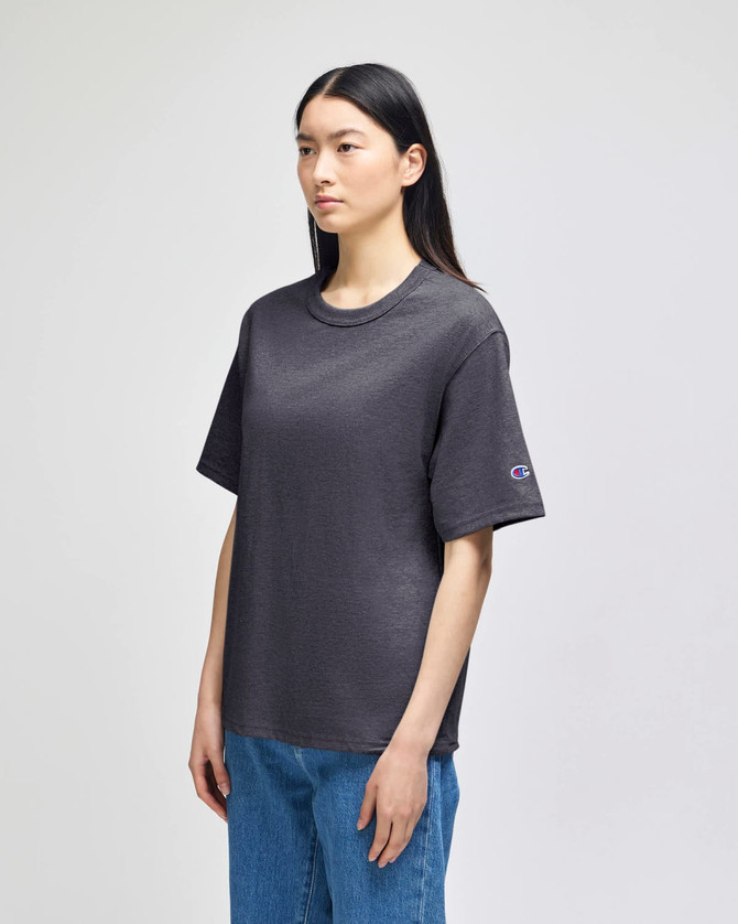 A dark grey pullover hooded sweatshirt with a logo, featuring a comfortable, relaxed fit.