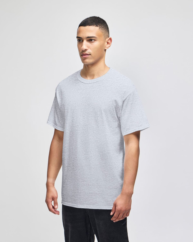 A grey adult short-sleeve t-shirt displayed on a model standing against a neutral background.