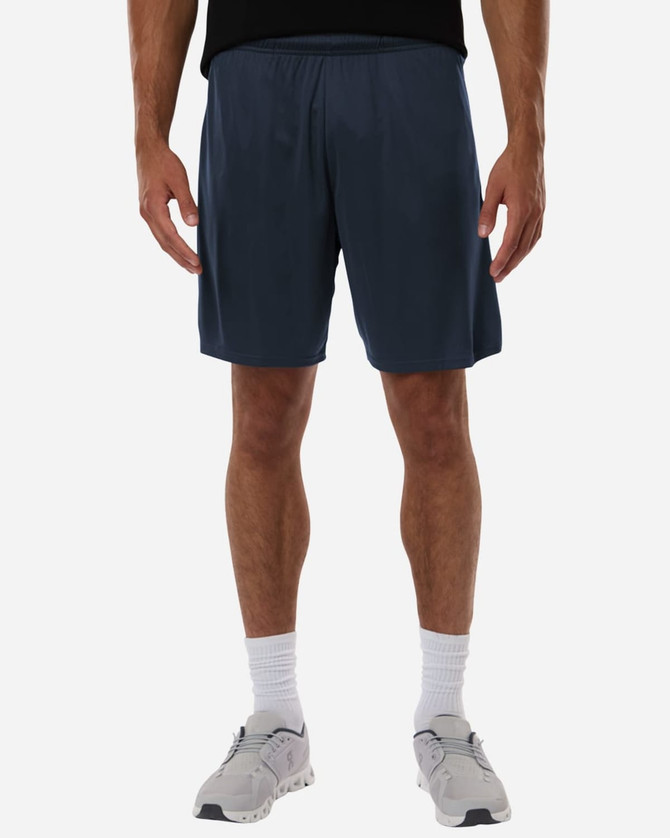 Men's Pro-Lock Performance Short in navy blue, featuring an elastic waistband and a logo. Model standing in sports shoes.