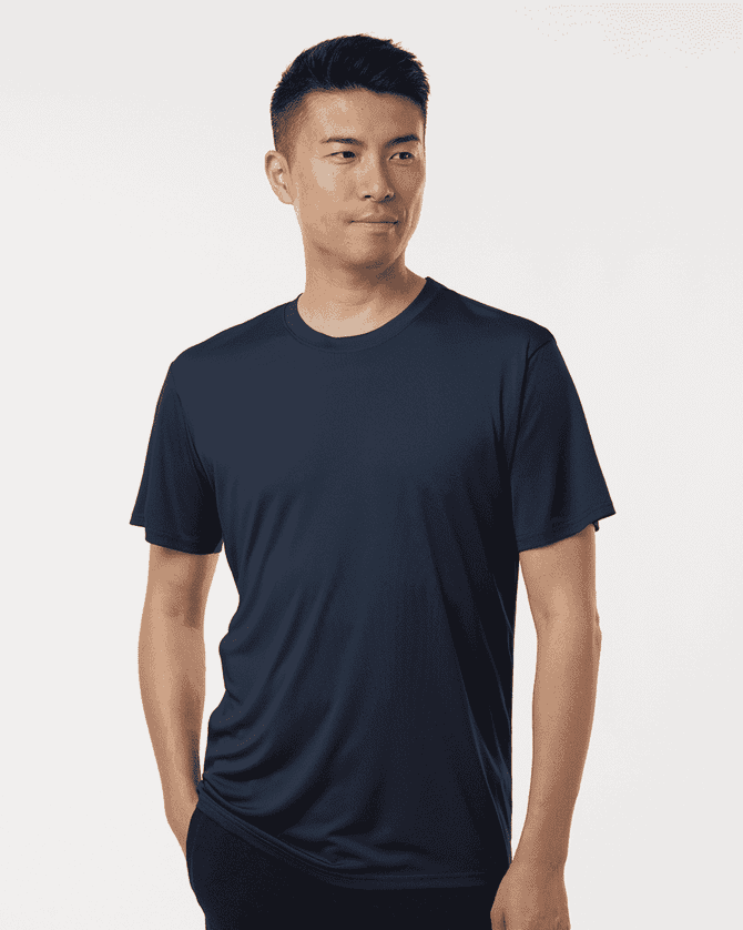 A navy blue men's performance T-shirt featuring a logo, designed for comfort and style.