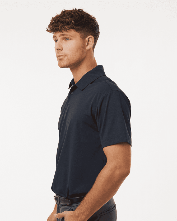 A navy blue polo shirt for men, featuring a collar and short sleeves, with a logo on the chest.