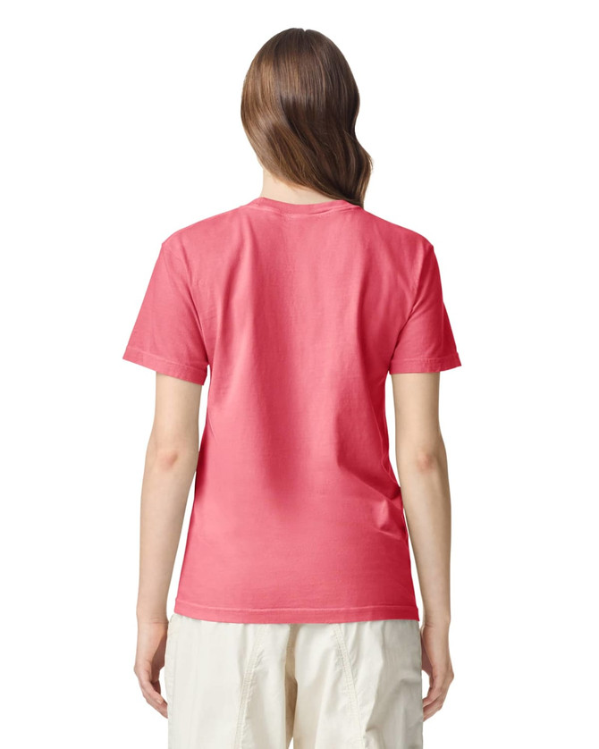 A pink adult heavyweight T-shirt seen from the back, showcasing a simple design and a logo on the back.